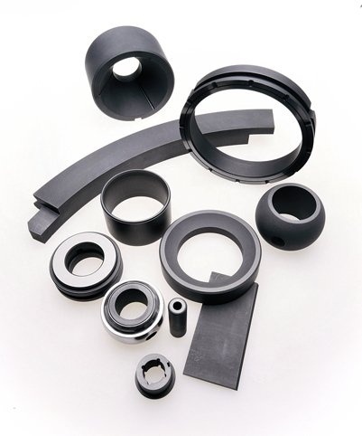 group of specialty mechanical carbon graphite components, including segmented seal rings