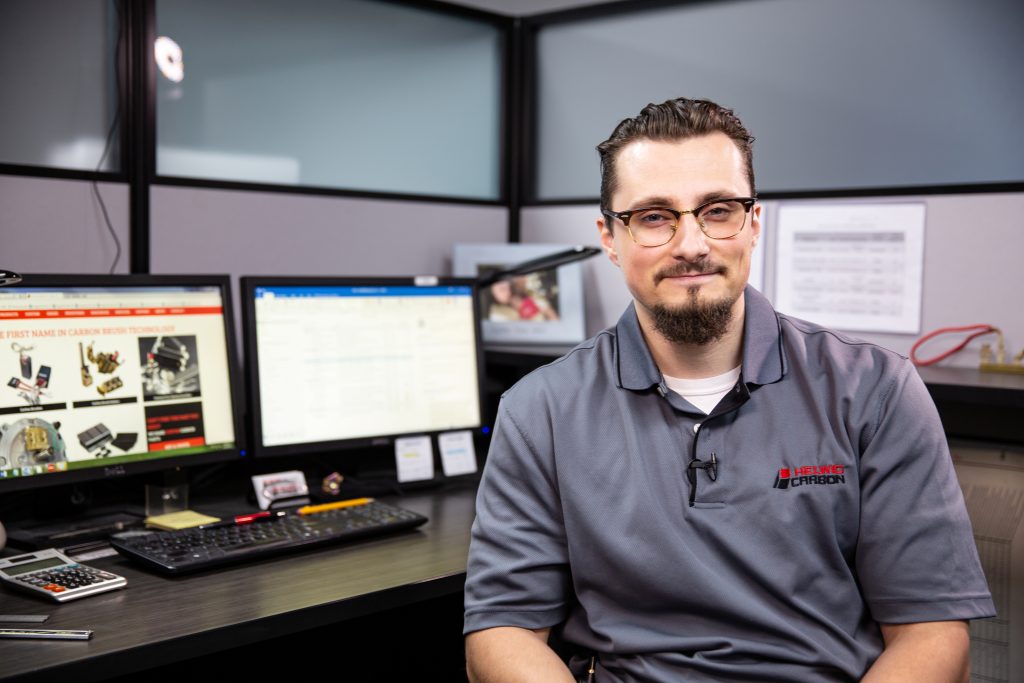 Copyrighted 2018 Ken Cooper. A man looks at the camera in the office at Helwig Carbon.