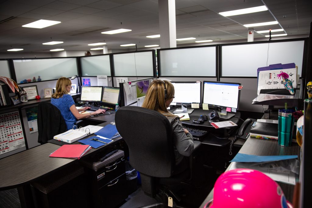 Copyrighted 2018 Ken Cooper. Two women work in an office at Helwg Carbon.
