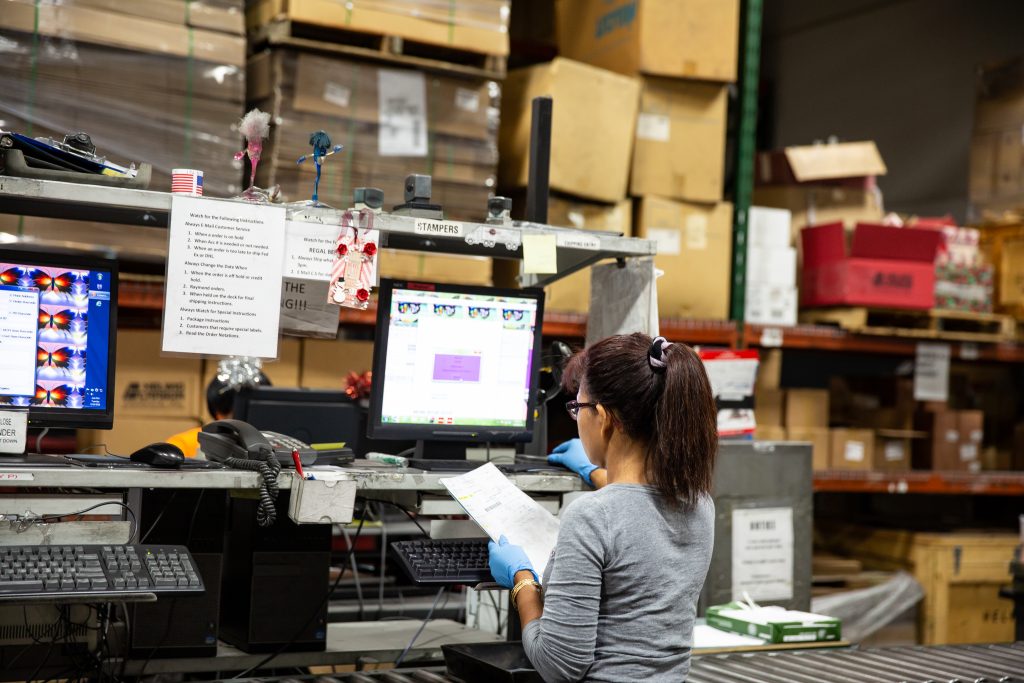 Copyrighted 2018 Ken Cooper | A woman works on a computer in the factory at Helwig Carbon